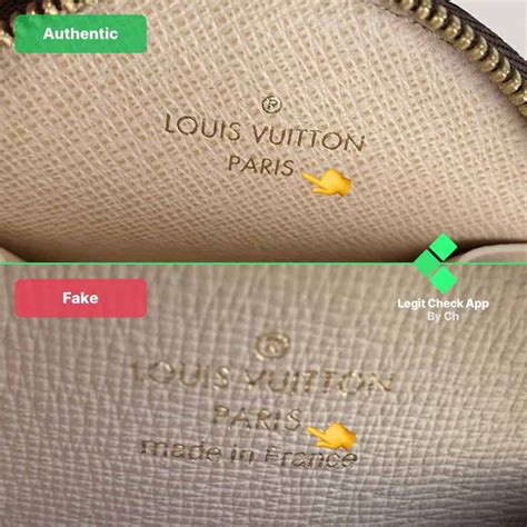 lv fake vs real bag|Lv authenticity card.